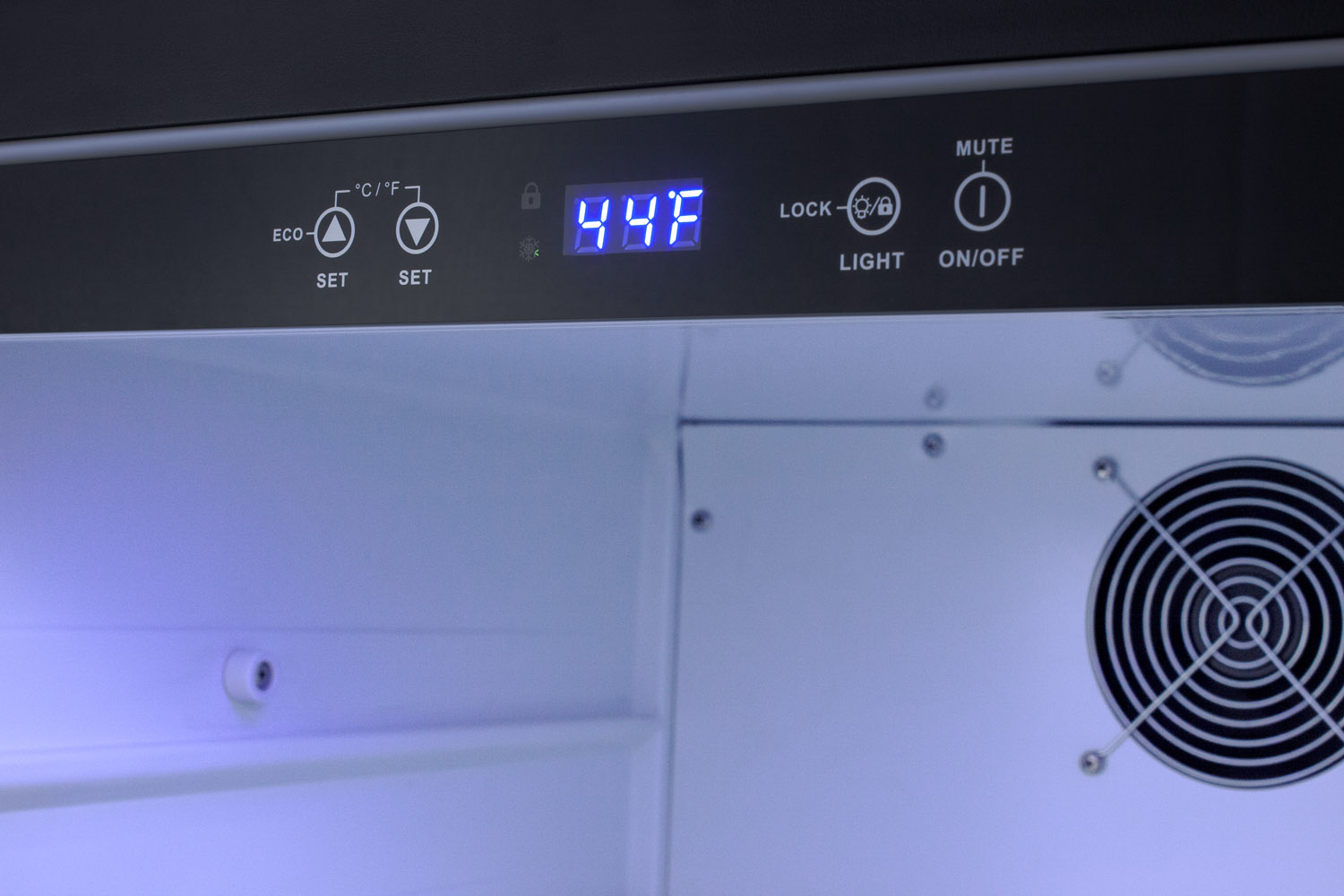 Built-in undercounter ADA compliant all-refrigerator with a panel ready door, black cabinet, door storage, lock, and digital controls